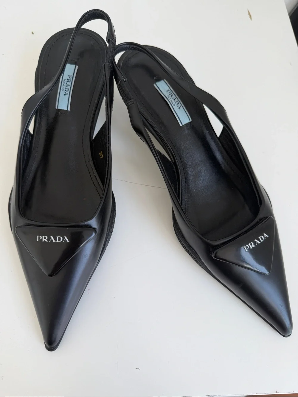 Prada Black Pointed Slingback Pumps with Logo Plaque